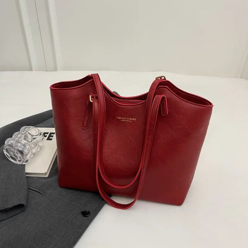 Nicole · Bolso tote vintage con dije – Silvia Morel