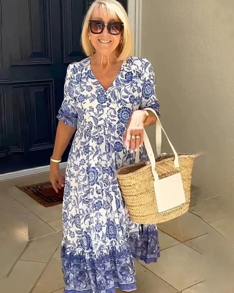Azulina · Vestido floral a media pierna – Silvia Morel