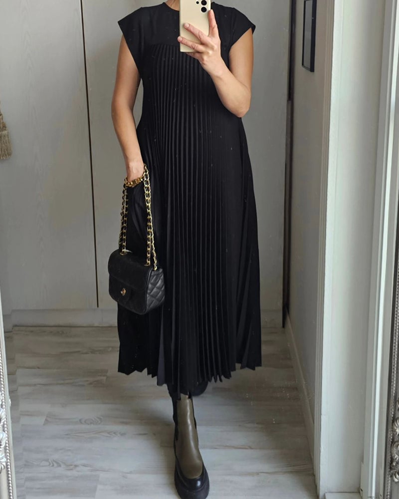 Ximena Plisada · Vestido plisado que estiliza – Silvia Morel