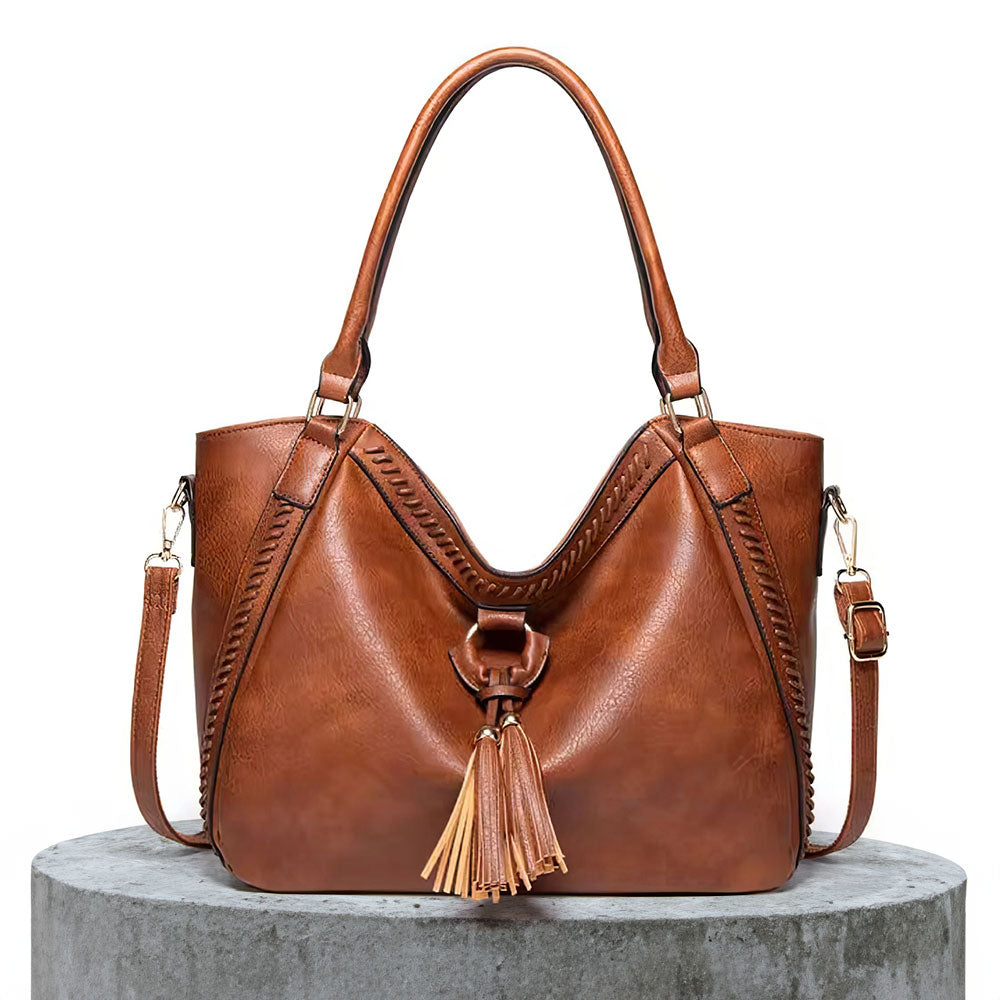 Carmel · Bolso de hombro con flecos – Silvia Morel