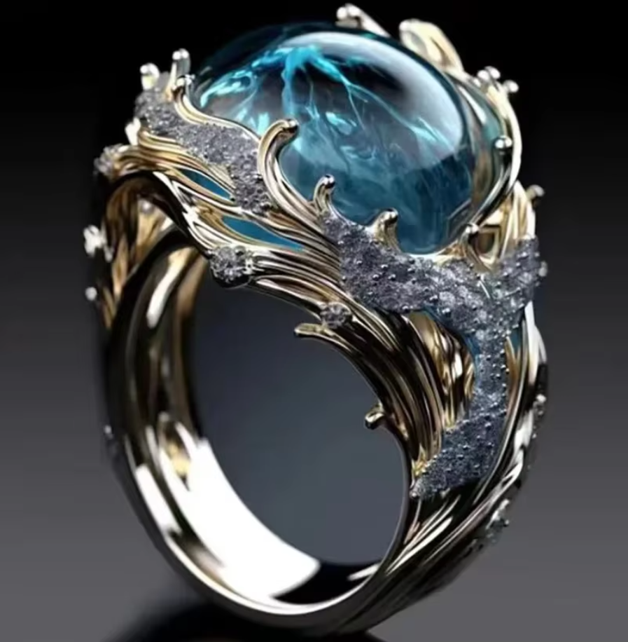 Ondina · Anillo ondulado dorado con piedra – Silvia Morel