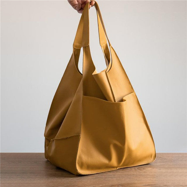 Diagonal · Bolso amplio de líneas elegantes – Silvia Morel