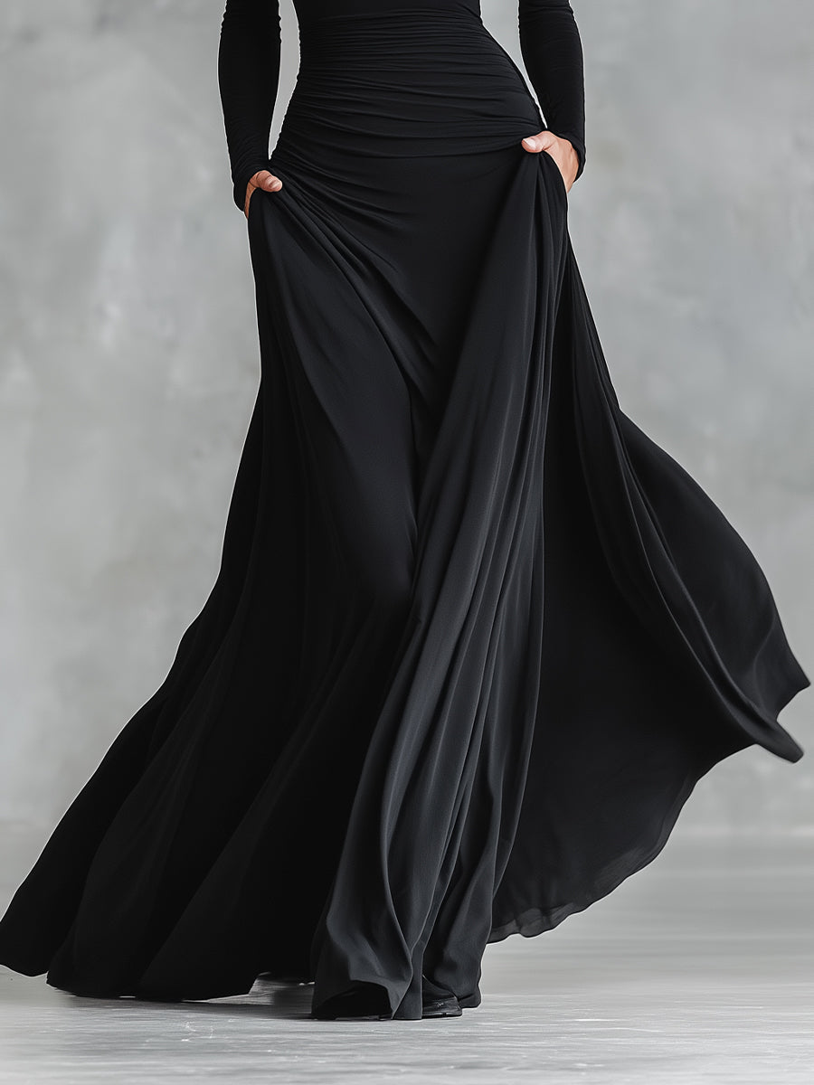 Azabache · Vestido largo negro plisado – Silvia Morel