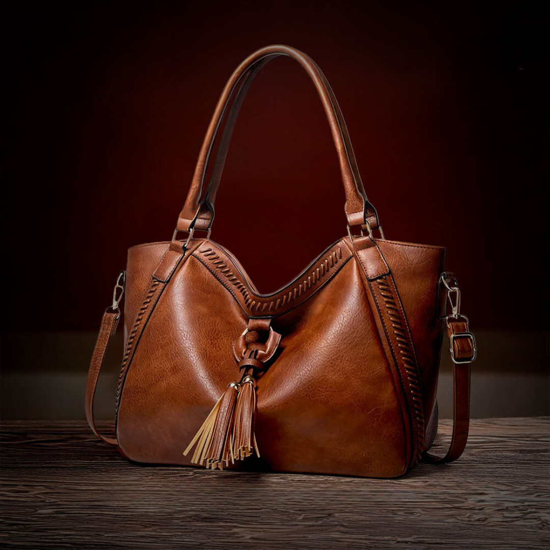 Carmel · Bolso de hombro con flecos – Silvia Morel