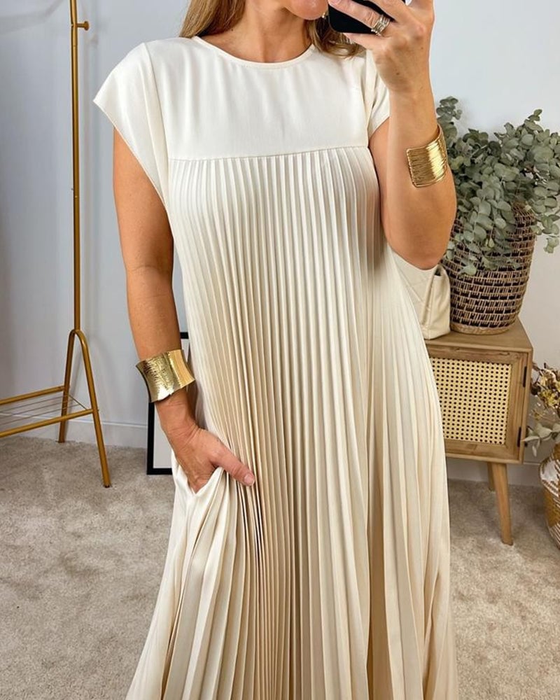 Ximena Plisada · Vestido plisado que estiliza – Silvia Morel