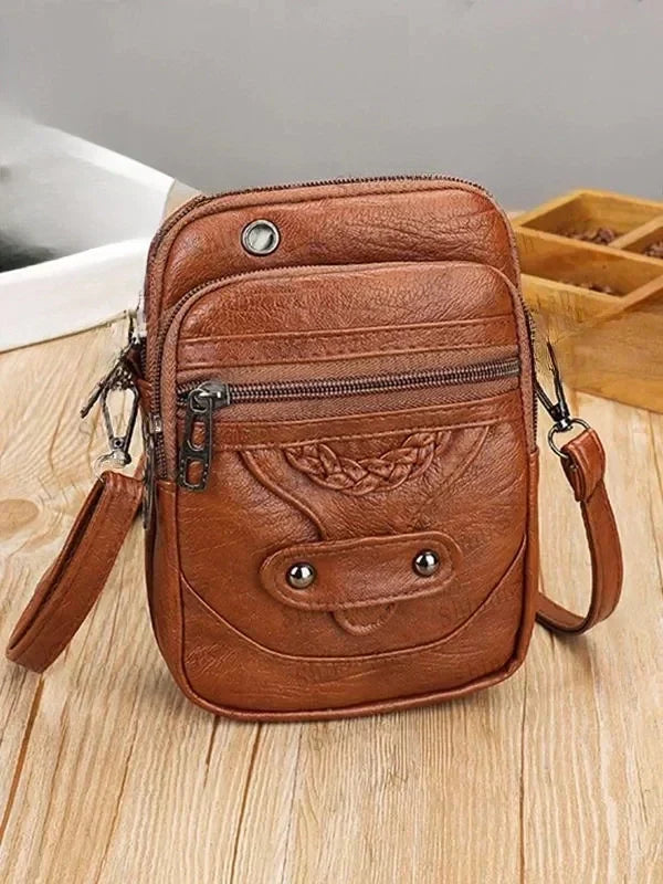 Laietana · Bolso bandolera vintage con tachuelas – Silvia Morel