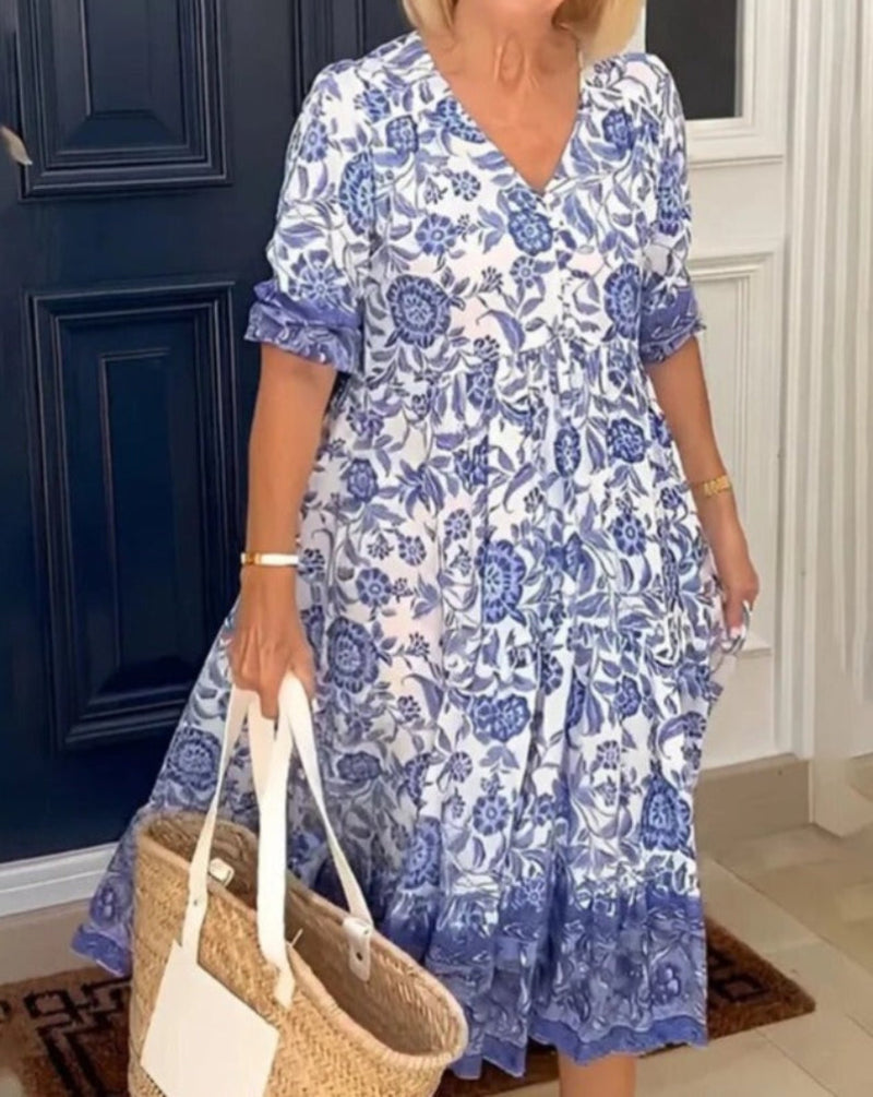 Azulina · Vestido floral a media pierna – Silvia Morel