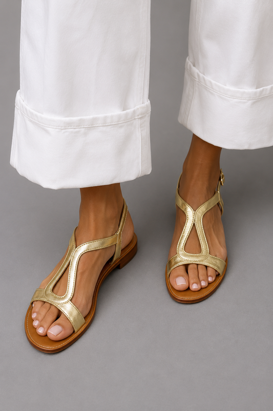 Flora · Sandalias planas brillantes – Silvia Morel