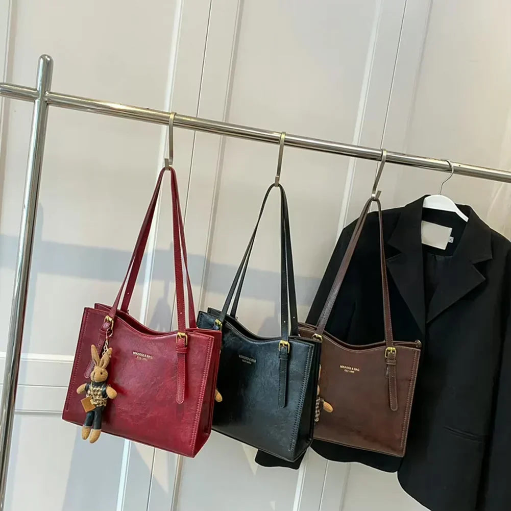 Marcela · Bolso de hombro vintage con llavero – Silvia Morel