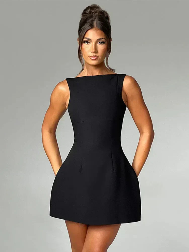 Ximena Noche · Vestido corto con espalda descubierta – Silvia Morel
