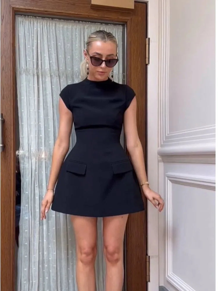 Ivonne · Vestido corto ajustado con bolsillos – Silvia Morel