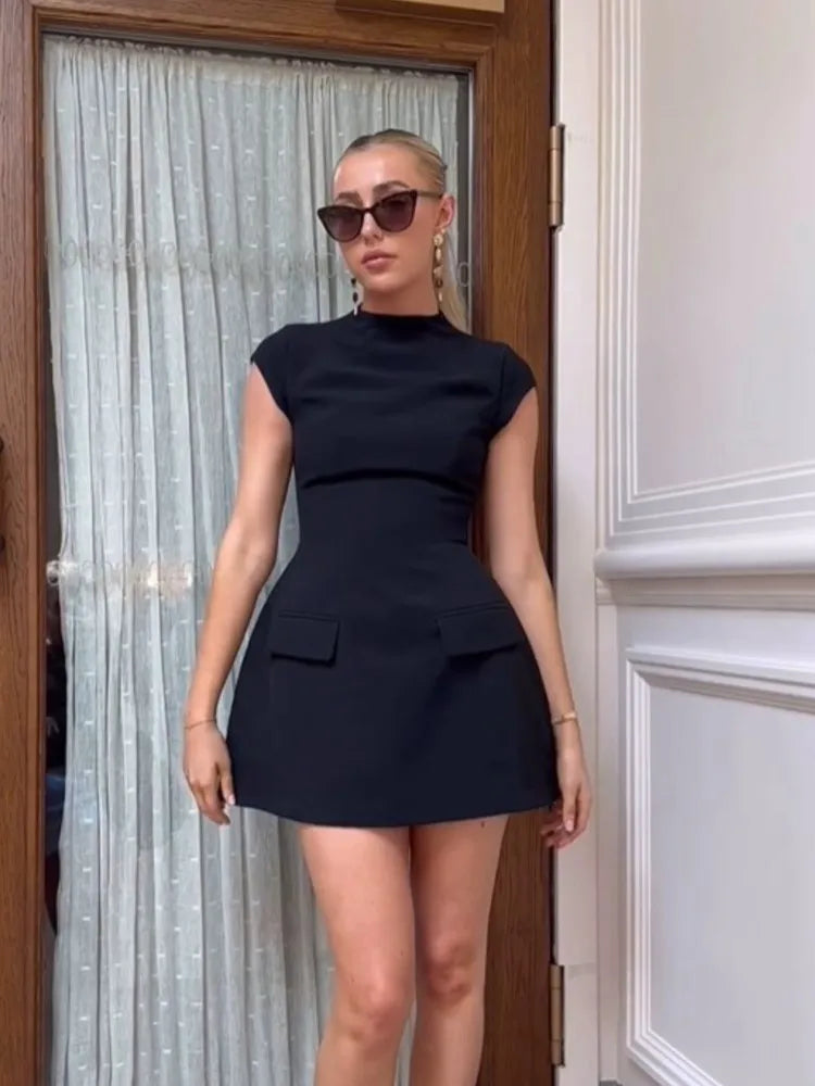Ivonne · Vestido corto ajustado con bolsillos – Silvia Morel