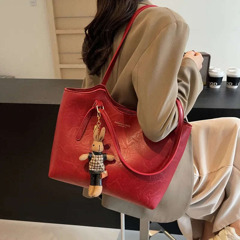 Nicole · Bolso tote vintage con dije – Silvia Morel