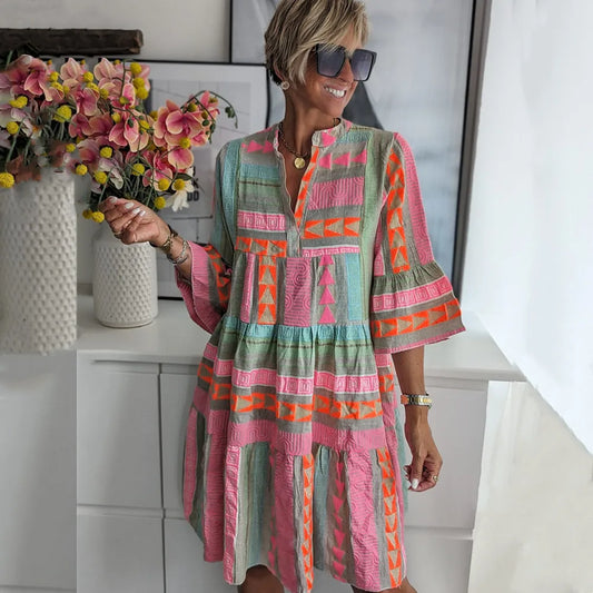 Irene · Vestido midi rosa con volantes – Silvia Morel