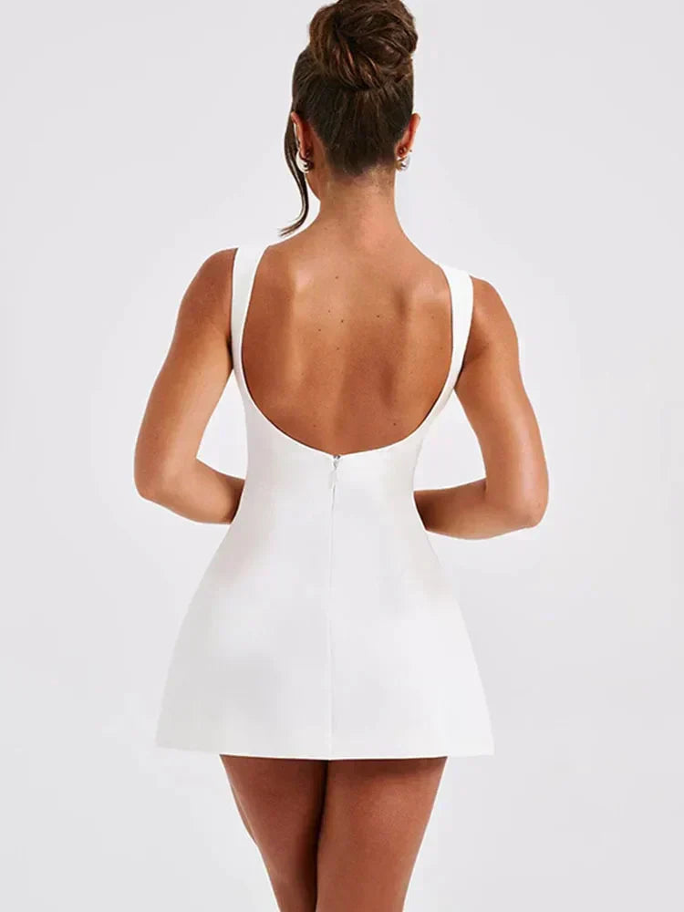 Ximena Noche · Vestido corto con espalda descubierta – Silvia Morel