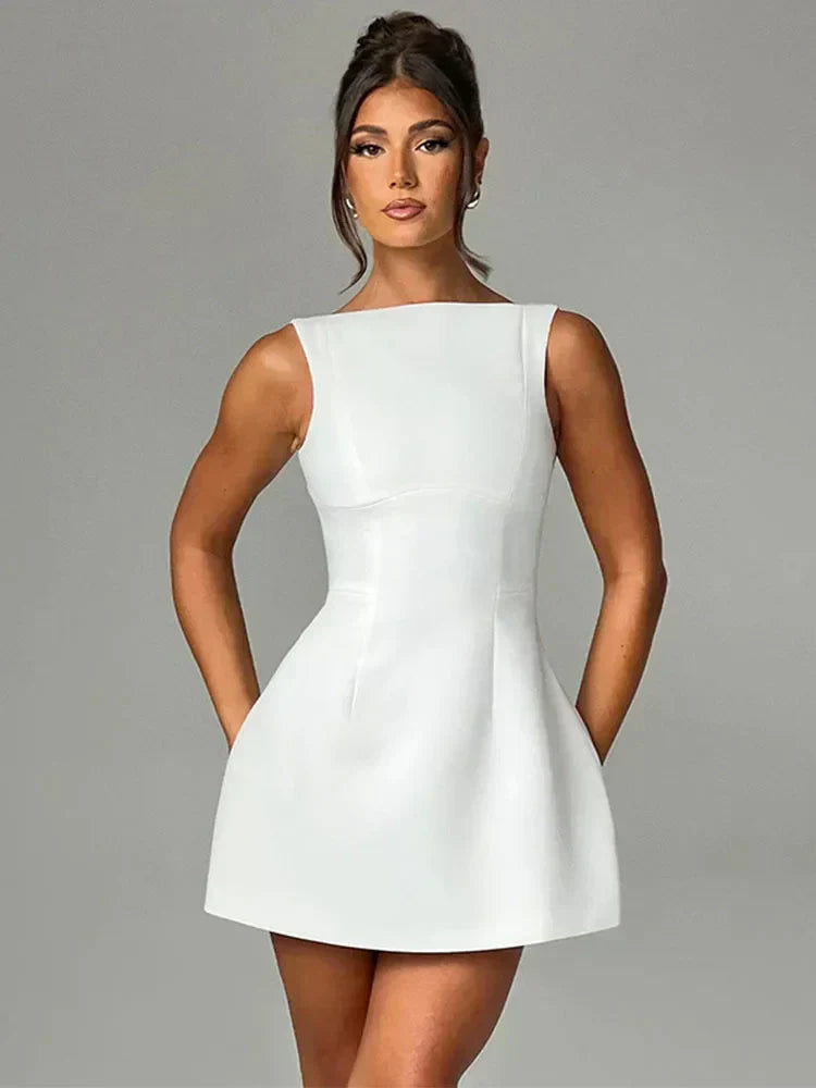 Ximena Noche · Vestido corto con espalda descubierta – Silvia Morel