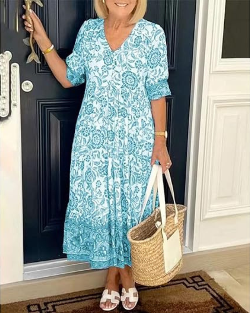 Azulina · Vestido floral a media pierna – Silvia Morel