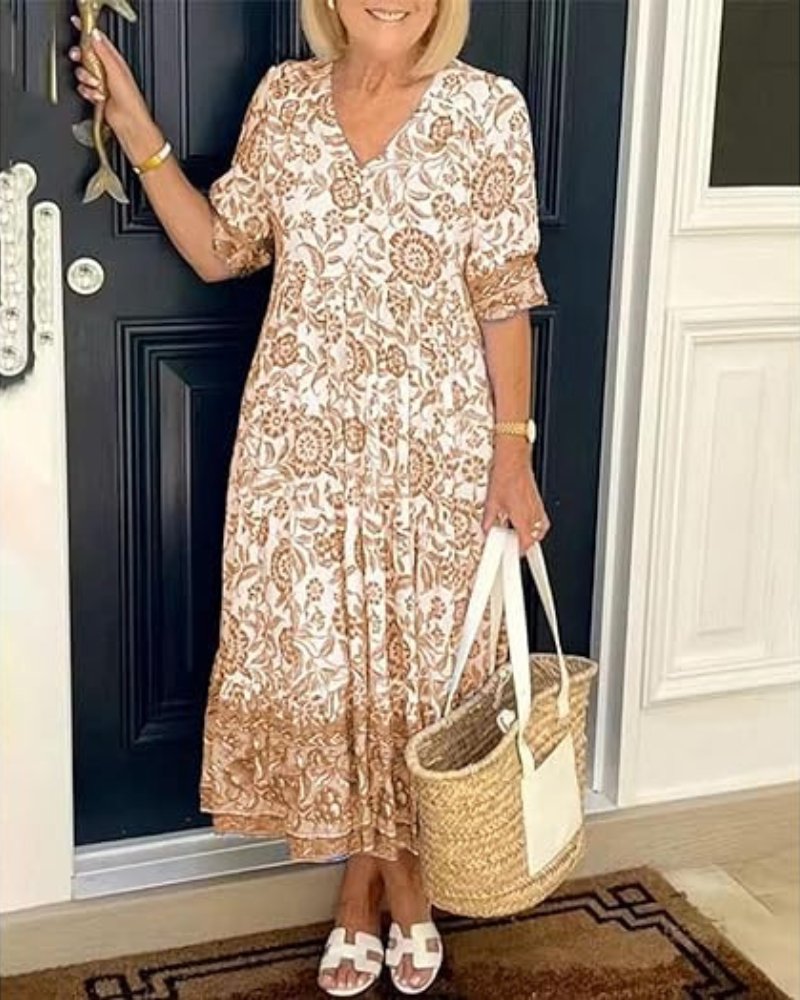 Azulina · Vestido floral a media pierna – Silvia Morel