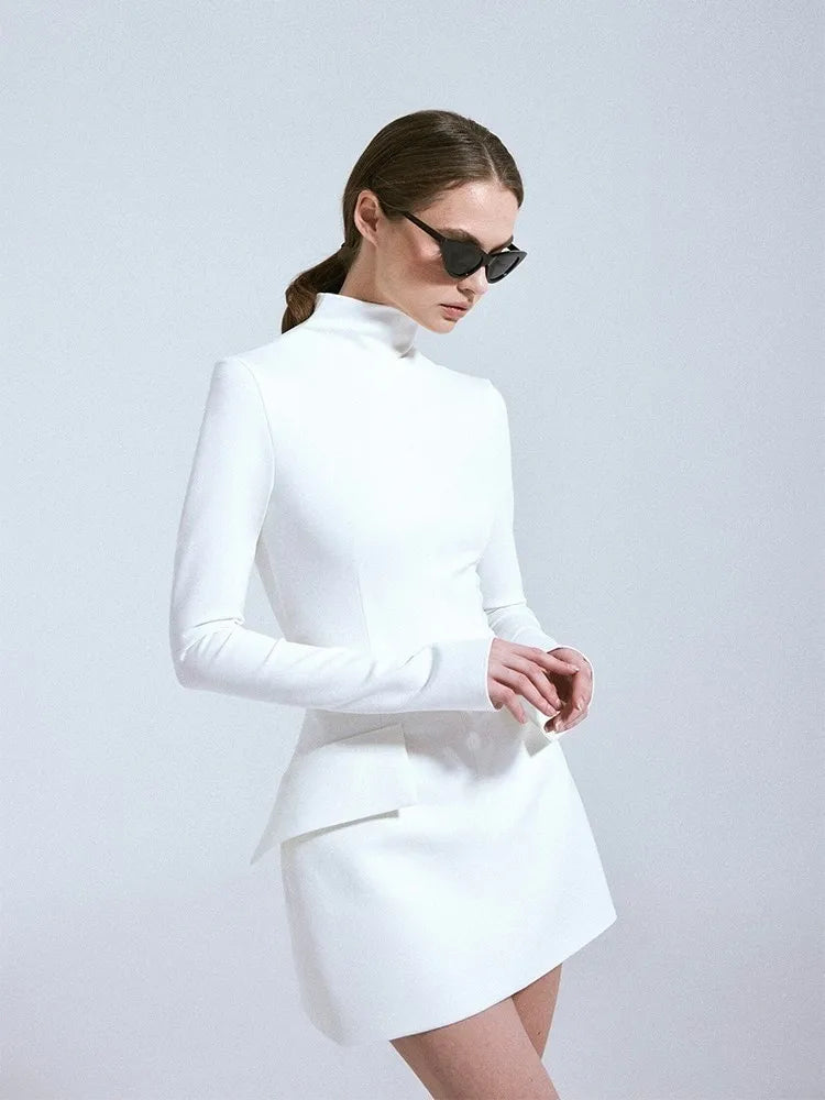 Vilma · Vestido corto de cuello alto con bolsillos – Silvia Morel