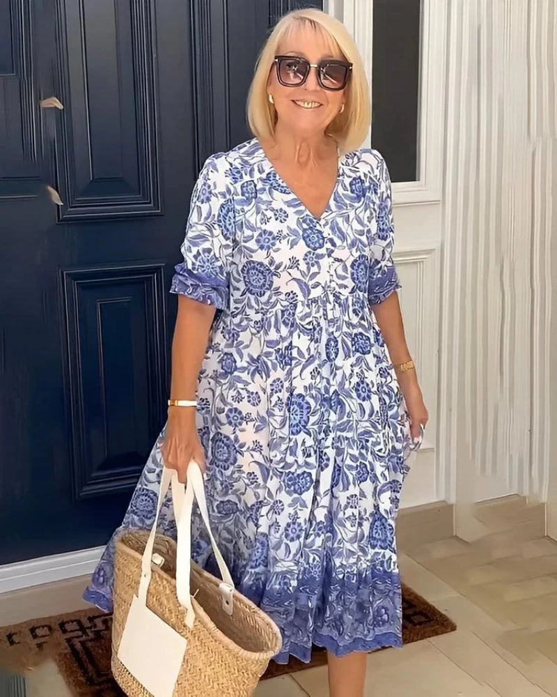 Azulina · Vestido floral a media pierna – Silvia Morel