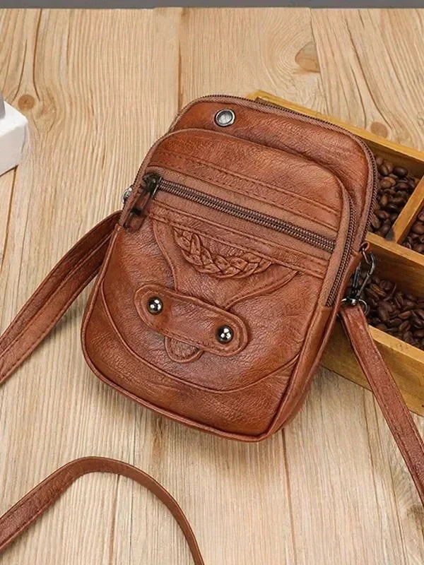 Laietana · Bolso bandolera vintage con tachuelas – Silvia Morel