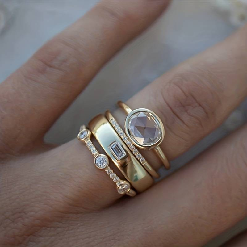Oceana · Set de anillos dorados con circonitas – Silvia Morel
